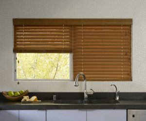 Faux wood blinds on kitchen window